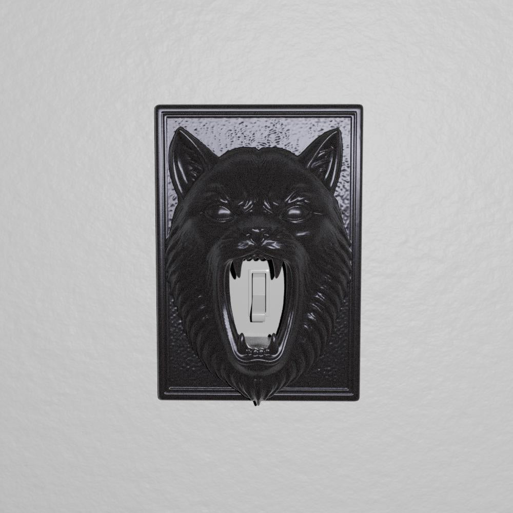 Angry Cat switch cover on a wall