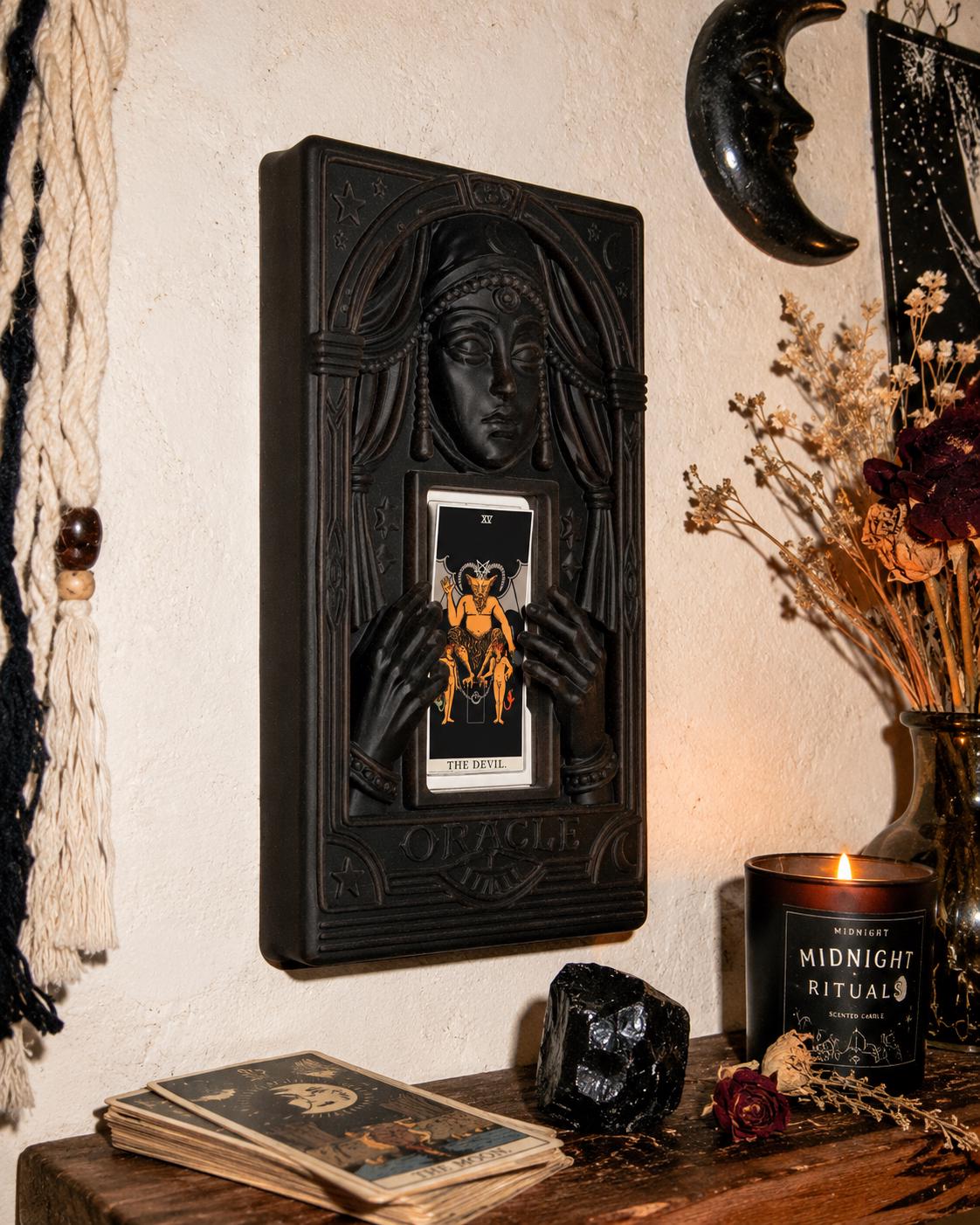 The Oracle tarot light switch cover — a veiled fortune teller holding up a tarot card over a rocker switch